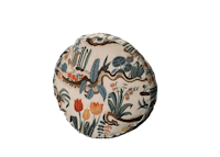 a cushion with a floral pattern on it